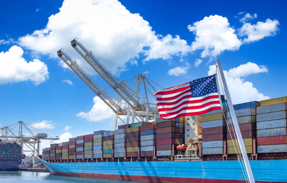 Cargo containers stacked in a modern logistics yard